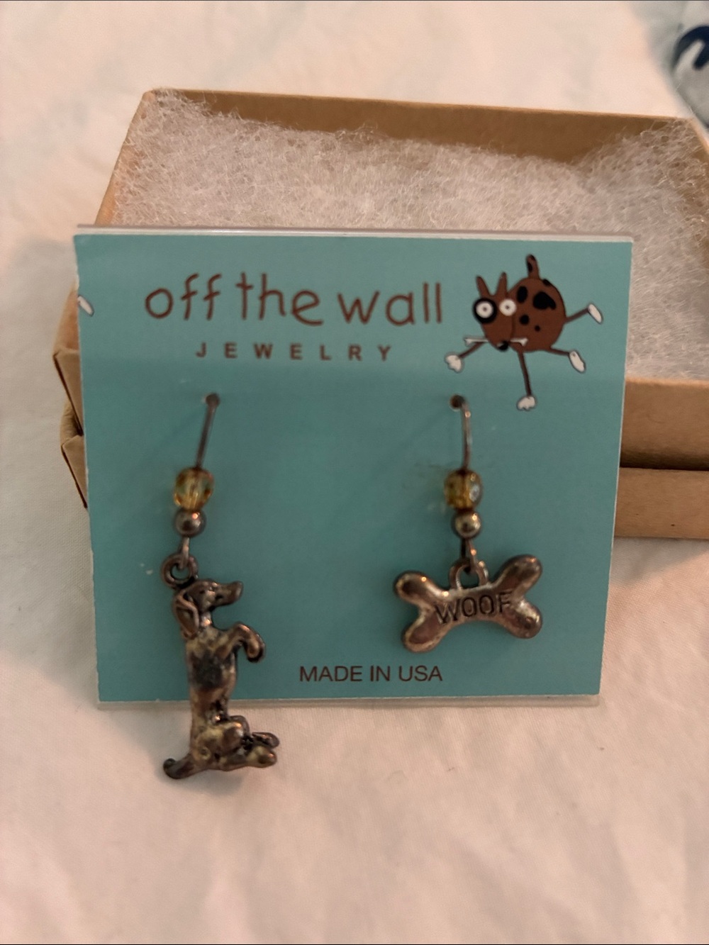 Silver dog charm earrings